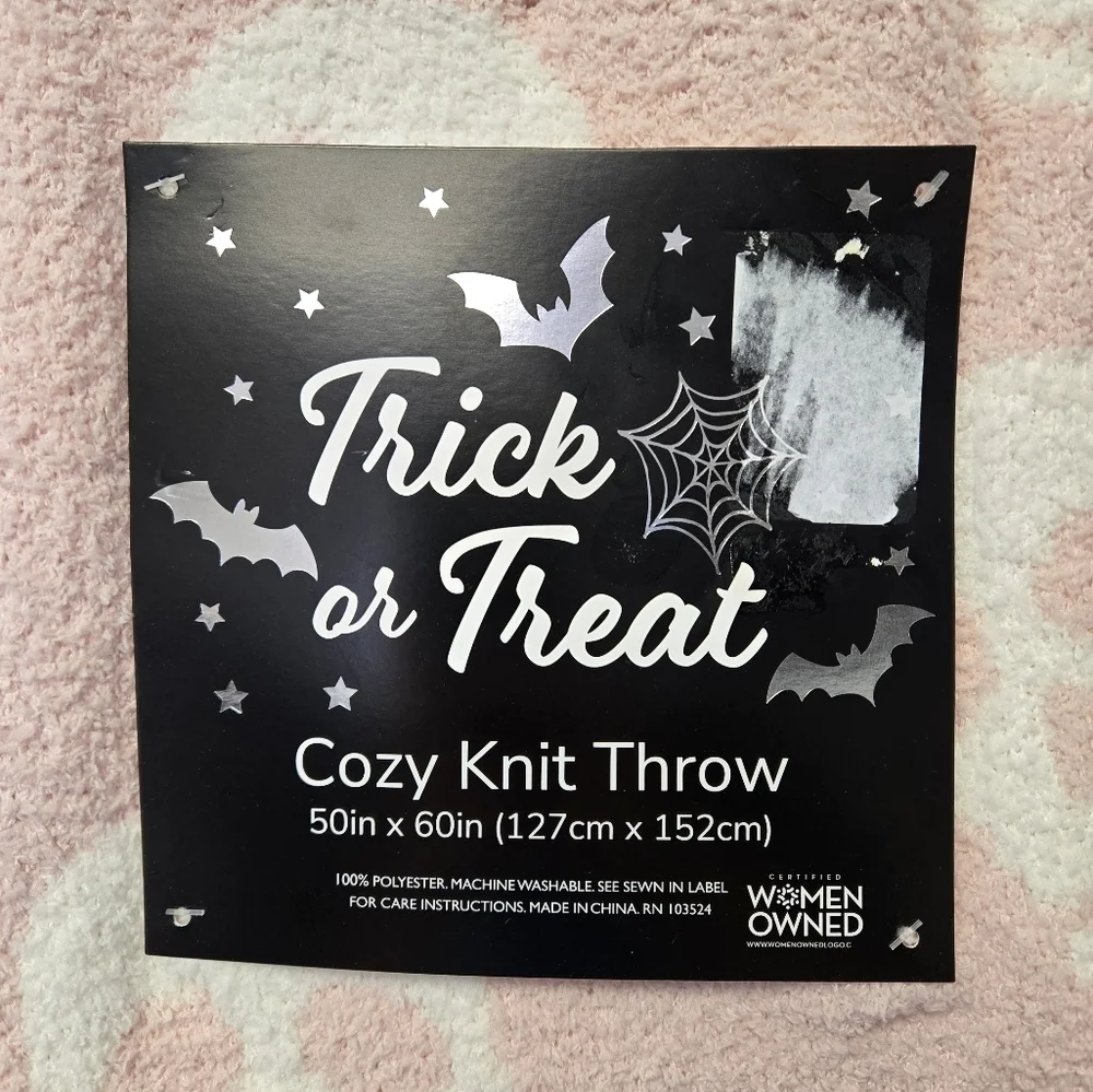 Trick or Treat Skulls Cozy Knit Throw Blanket Pink White